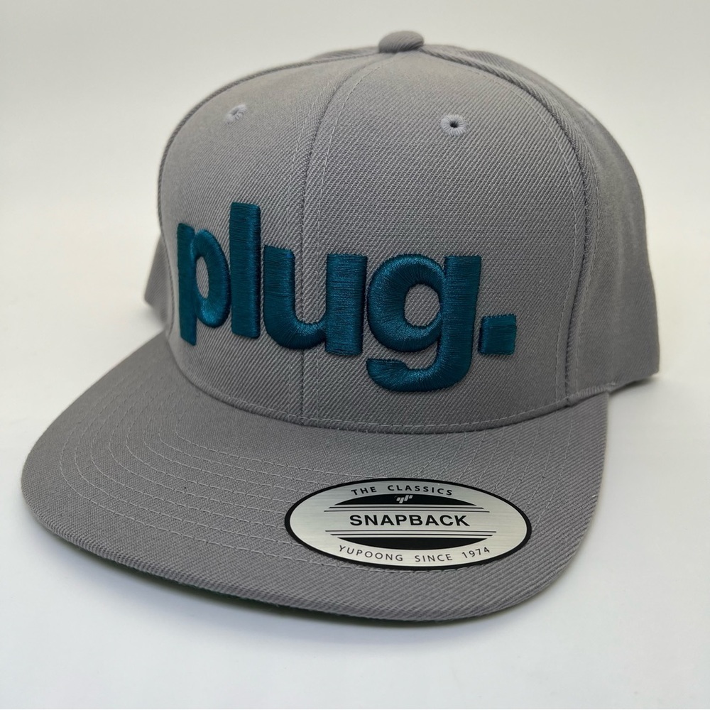 Plug Grey with Aqua Blue Lettering SnapBack Yupoong Hat New